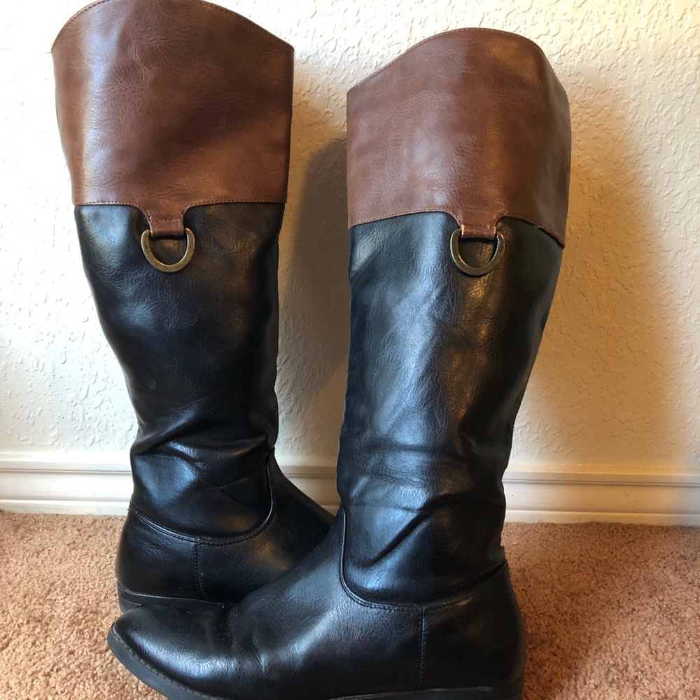Brown and black riding boots